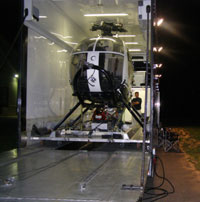 helicopter loaded in truck